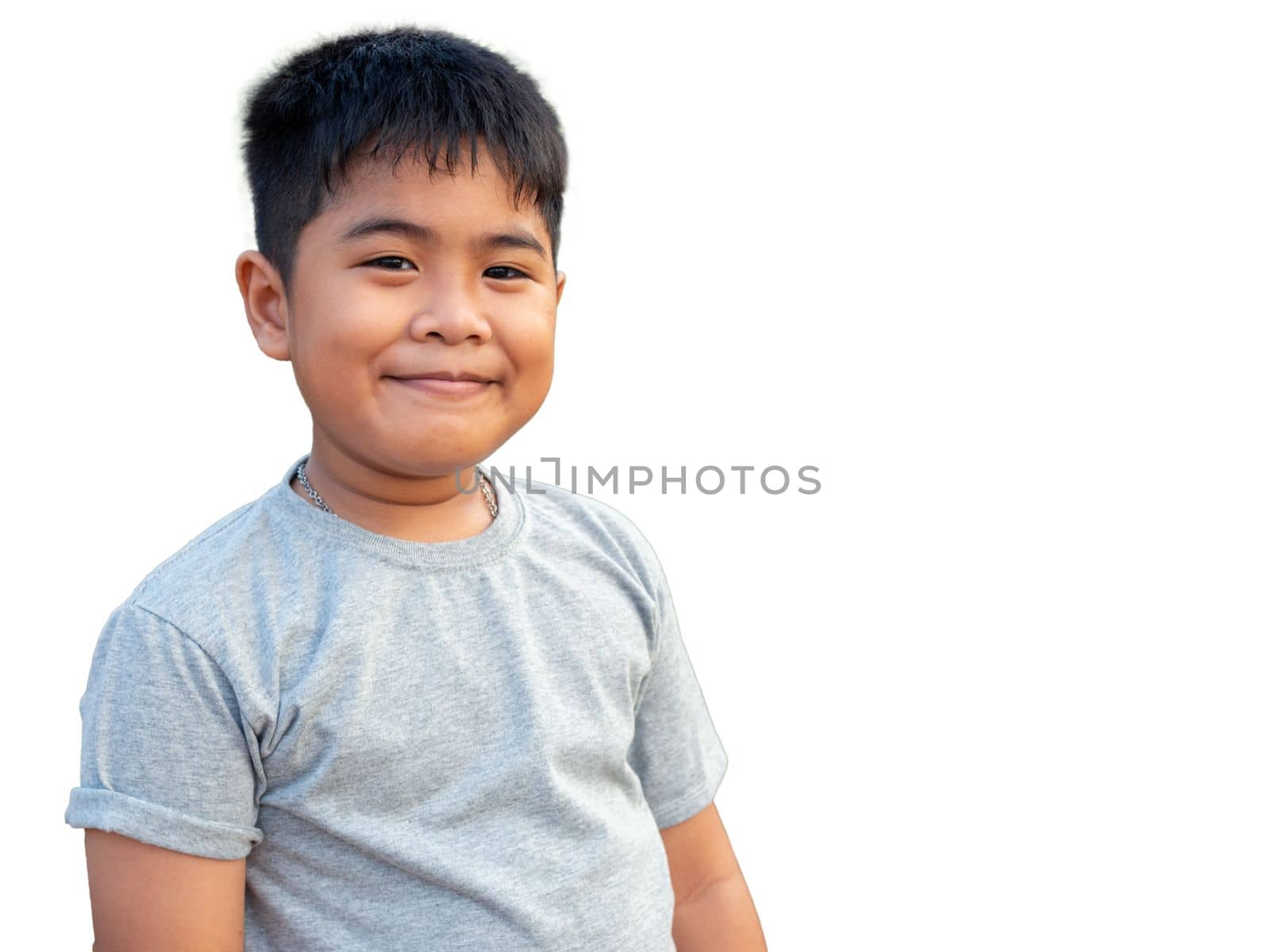 Portrait of smiling boy isolated on white background