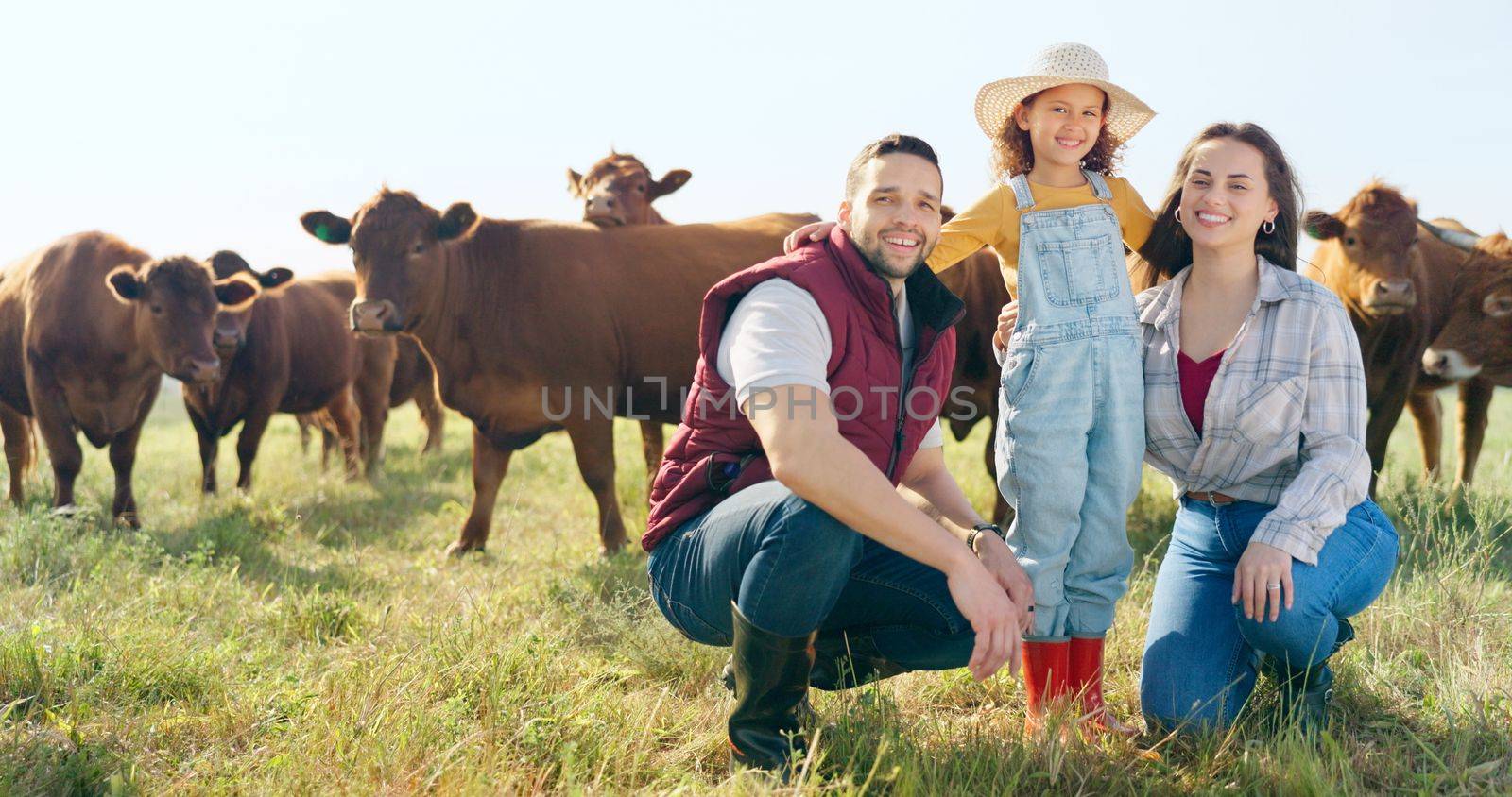 Farm, portrait and family bonding in nature, looking at animals and learning about livestock. Farming, agriculture and farmer parents bonding with girl on sustainable cattle business, relax and happy.