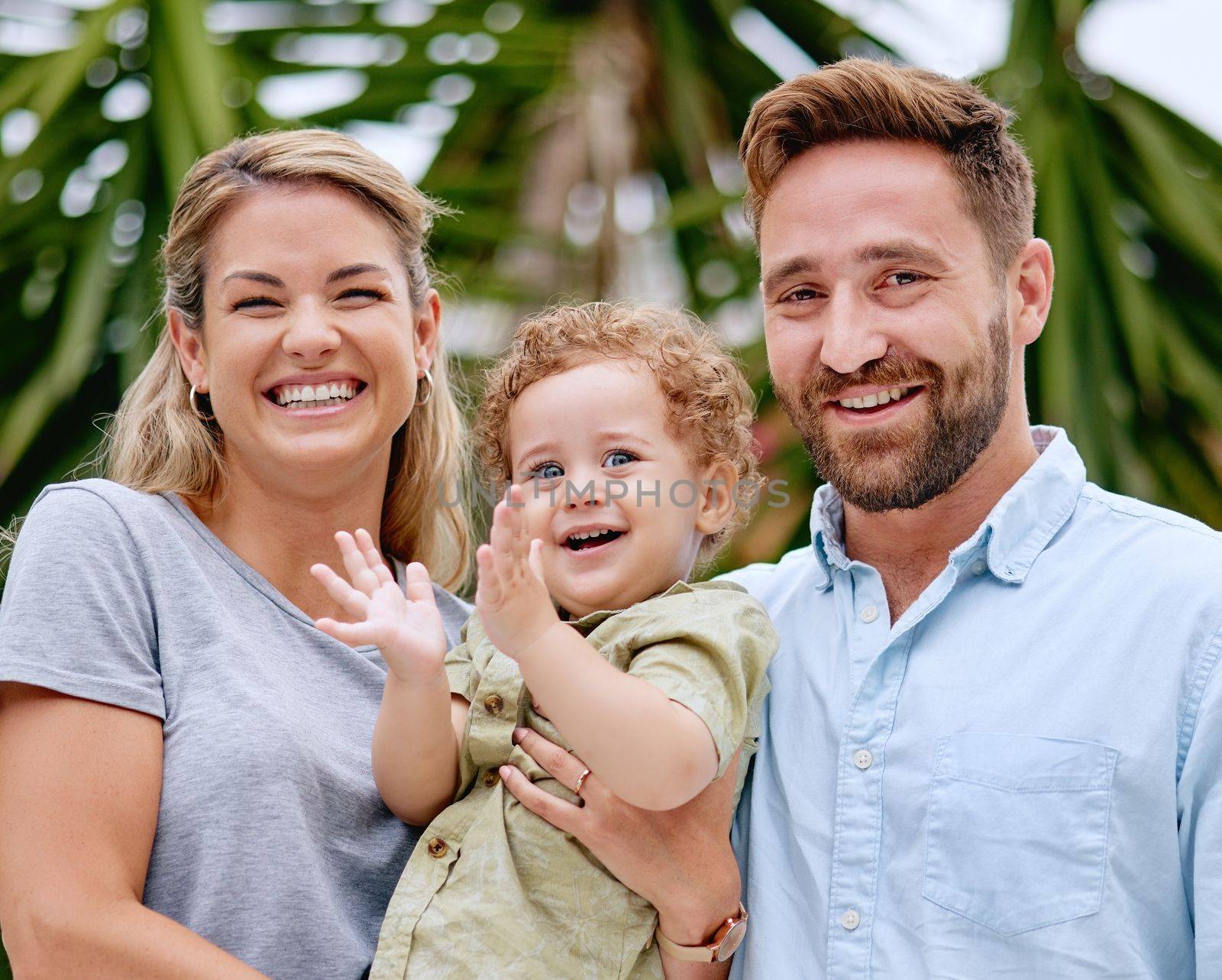 Family, baby and fun for love, bond and care in the garden outside. Happy parents bonding with their son in the park with loving, caring and affection. Kids, summer and mother and father together.