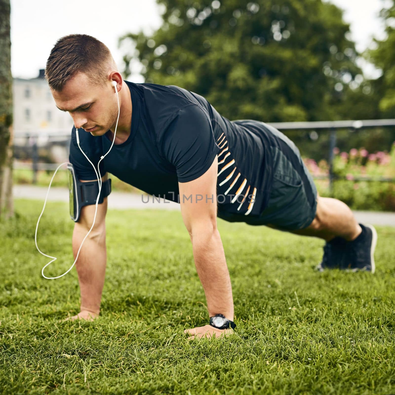 Push yourself further a little more every time. a sporty young man exercising outdoors