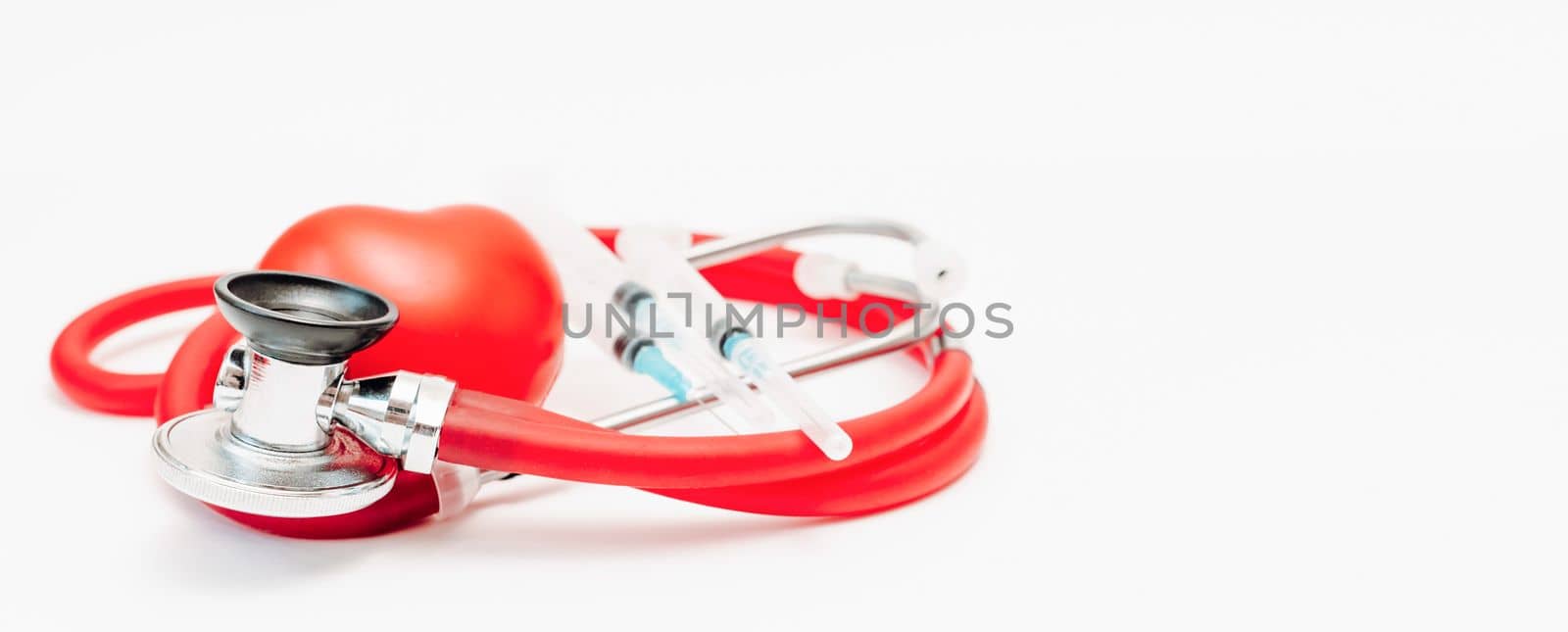 Heart stethoscope syringe baner. On white background, heart health, health insurance concept.