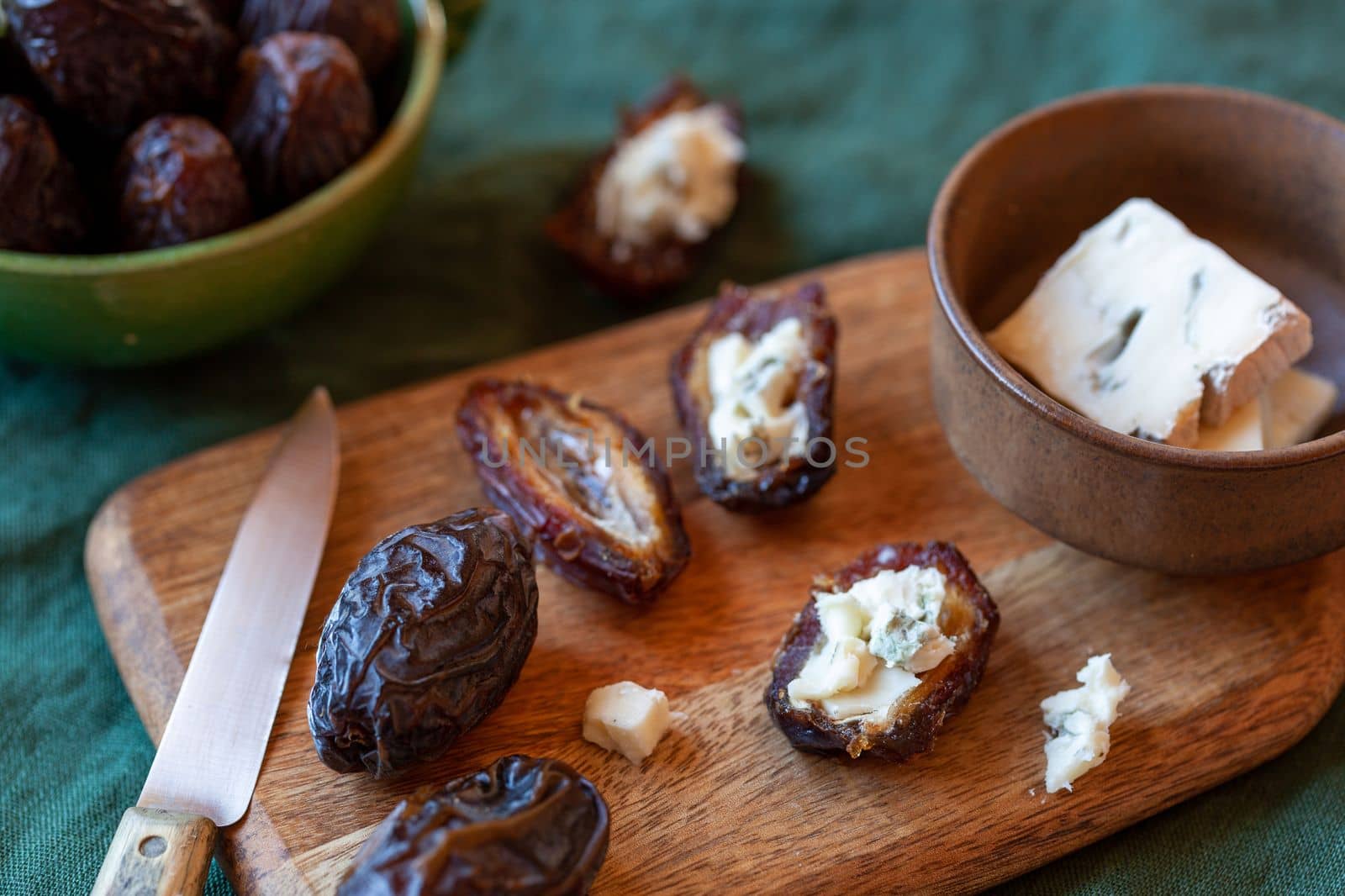 date fruits stuffed with gorgonzola cheese, side view