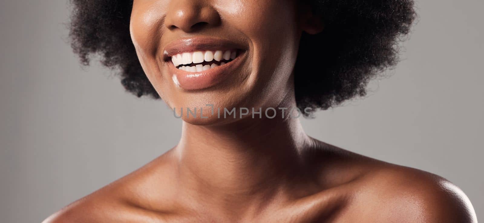 Enhance your beauty rather than hiding it. Studio shot of a unrecognizable female posing against a grey background. by YuriArcurs