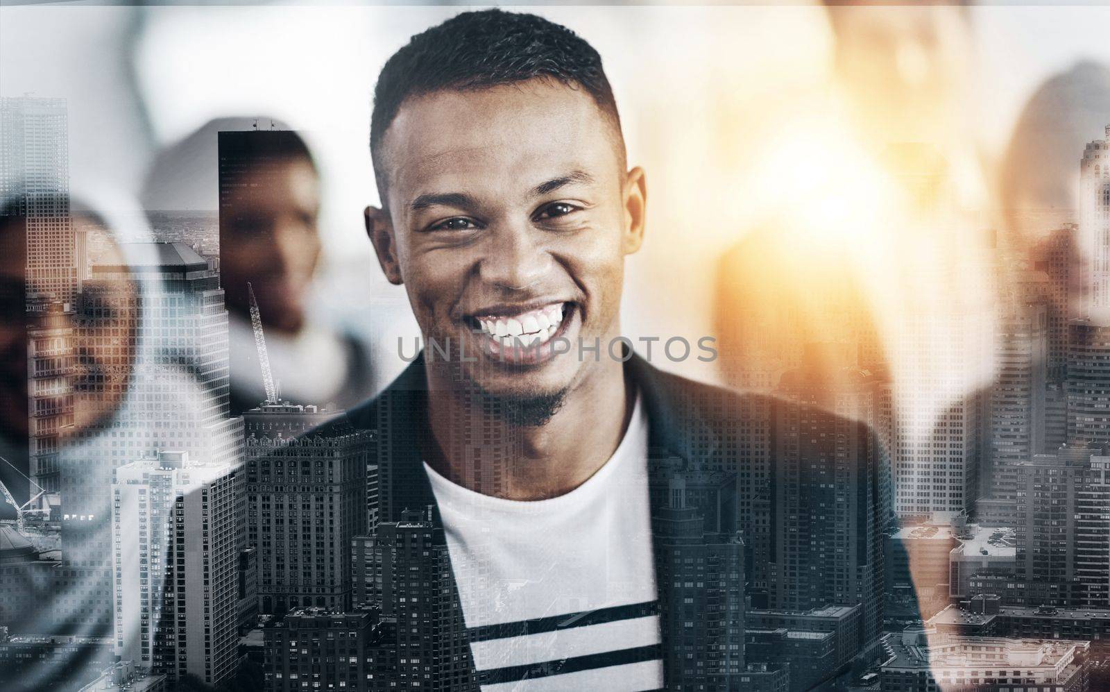 Striving to succeed. Portrait of a cheerful young businessman standing in the office at work during the day