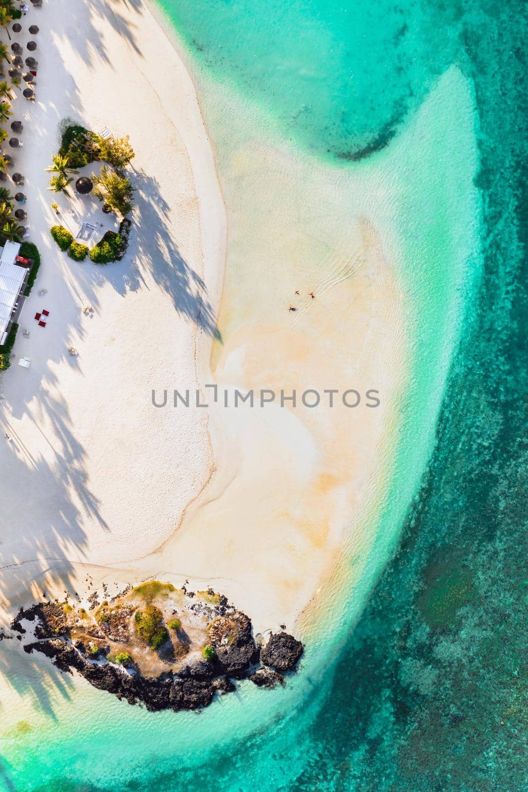 Aerial picture of the east coast of Mauritius Island. Flying above the turquoise lagoon of Mauritius in the region of Belle Mare. by Lobachad