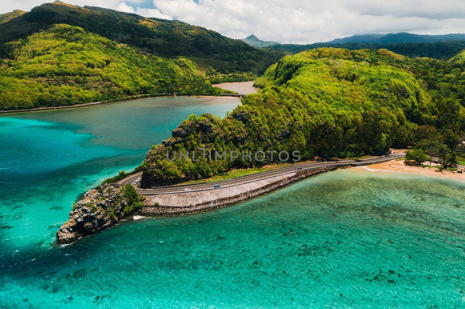 Maconde view point.Monument to captain Matthew Flinders in Mauritius. An unusual road to the Islands of Mauritius. Coral reef in the Indian ocean by Lobachad