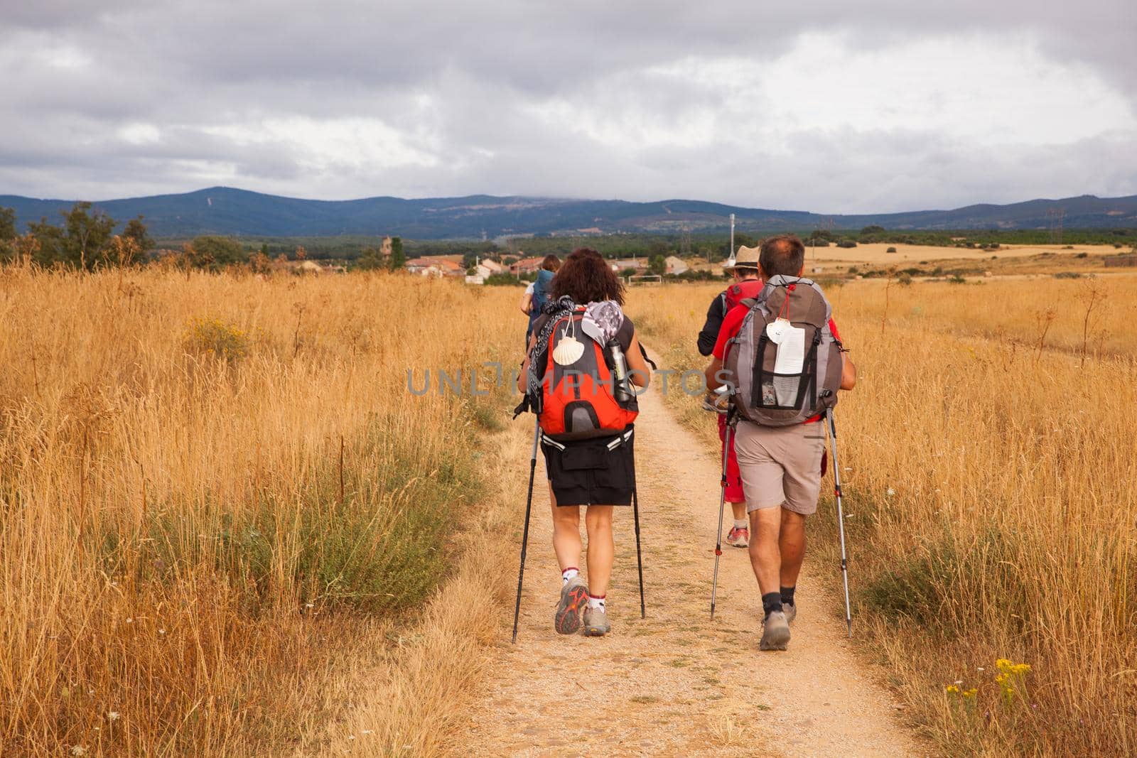 ASTORGA COUNTRYSIDE, SPAIN - AUGUST, 04: Pilgrims along the way of St. James on August 03, 2016