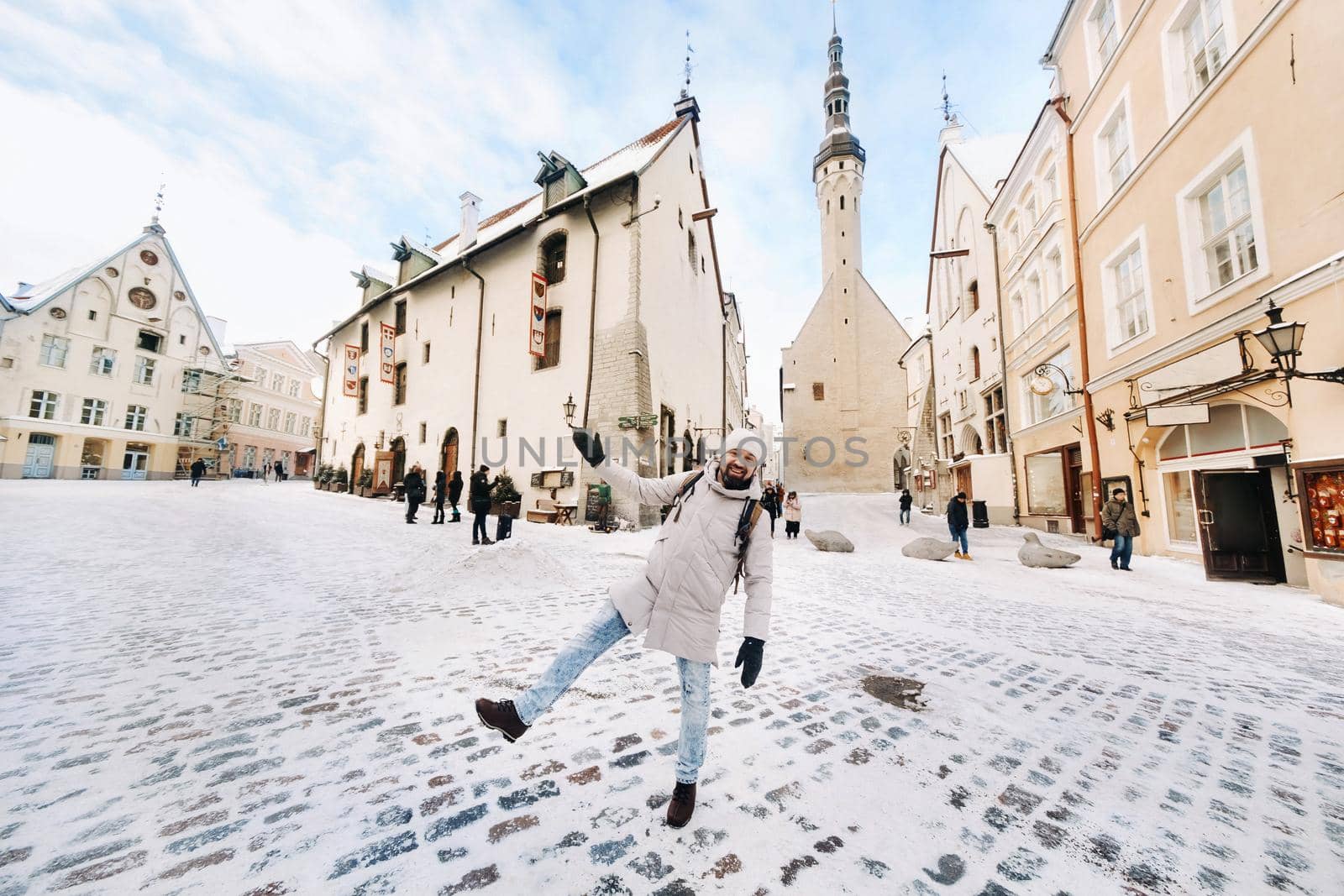 male tourist outdoors in winter in the old town of Tallinn.Estonia.