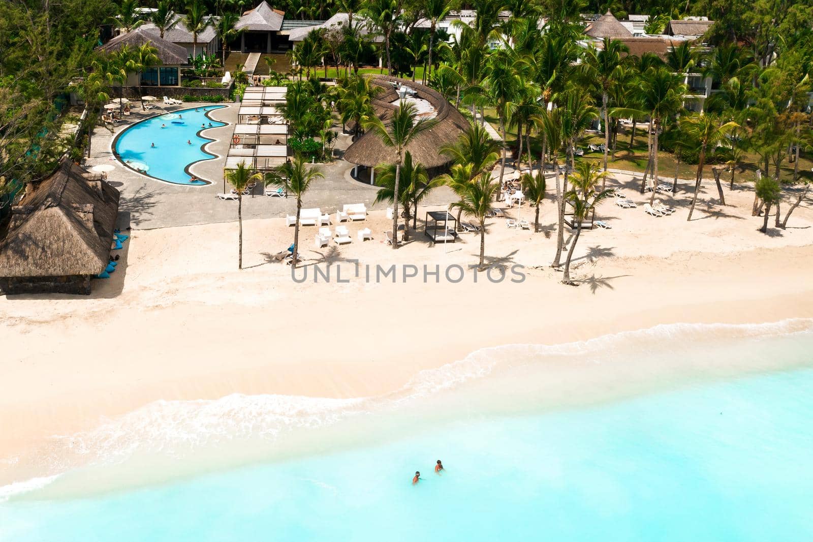 View from the height of the beach in the Indian Ocean on the island of Mauritius. by Lobachad