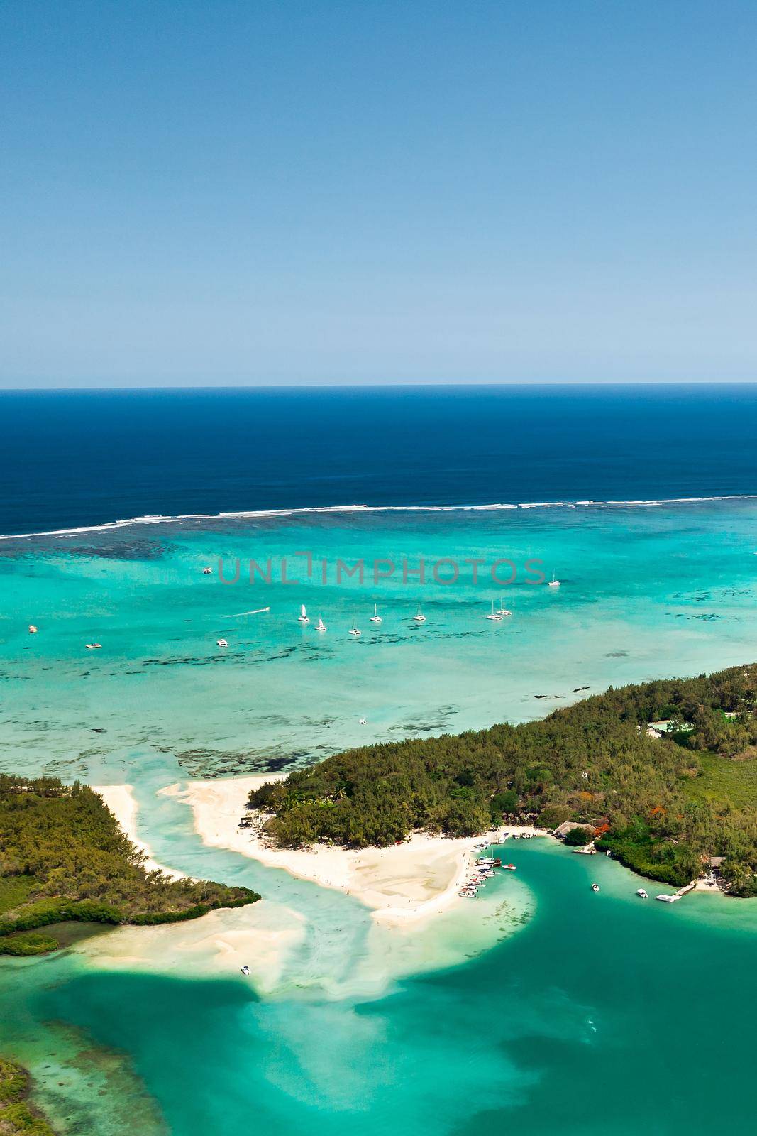 Top view of the lagoon and coral reef of Mauritius in the Indian Ocean.