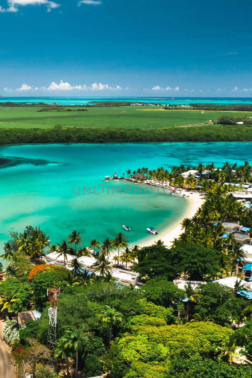 View from the height of the east coast of the island of Mauritius in the Indian Ocean. Beautiful lagoon of the island of Mauritius, by Lobachad