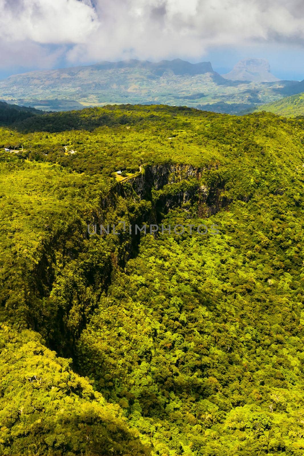 Bird's-eye view of the mountains and fields of the island of Mauritius.Landscapes Of Mauritius. by Lobachad