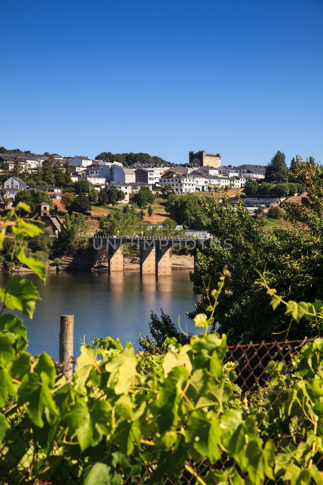 Roman bridge over the Minho River in Portomarin, Spain