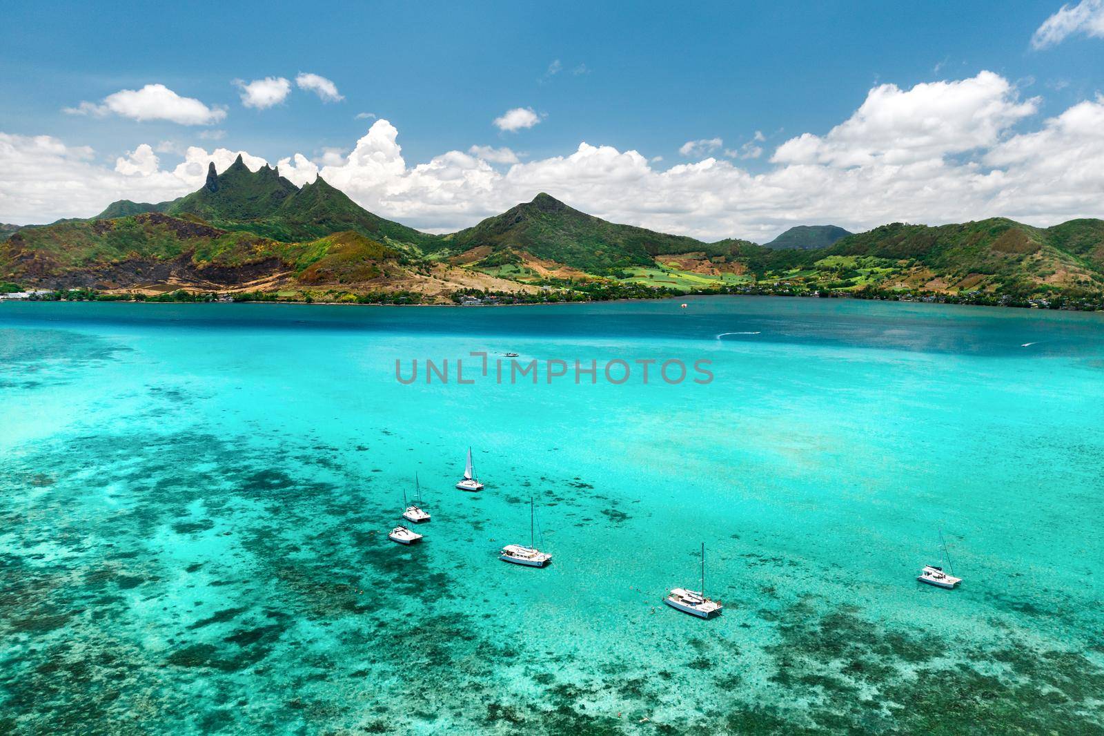 Top view of the lagoon and coral reef of Mauritius in the Indian Ocean by Lobachad