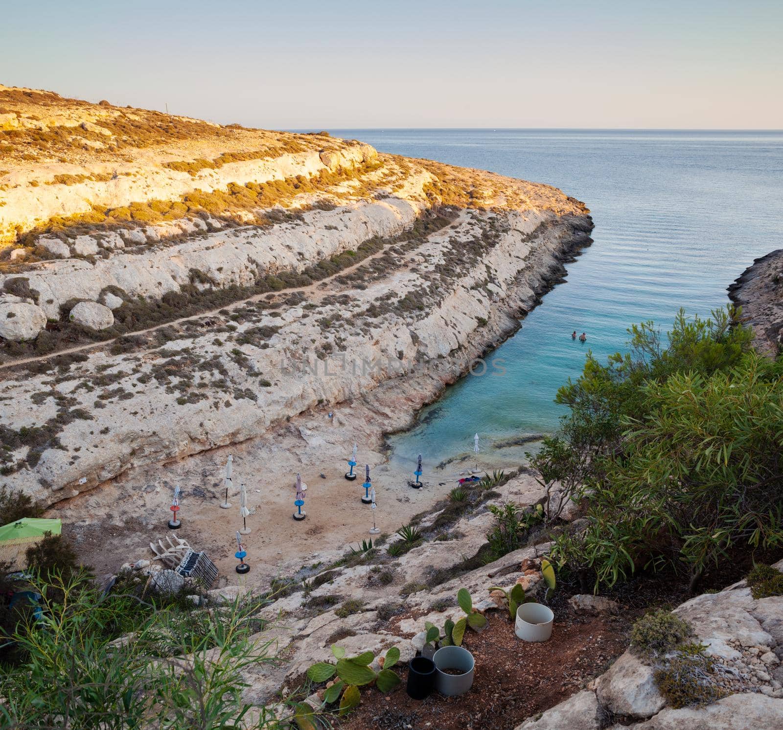 LAMPEDUSA, ITALY - JULY, 29: View of Cala Greca at sunset in the summer season on July 29, 2018