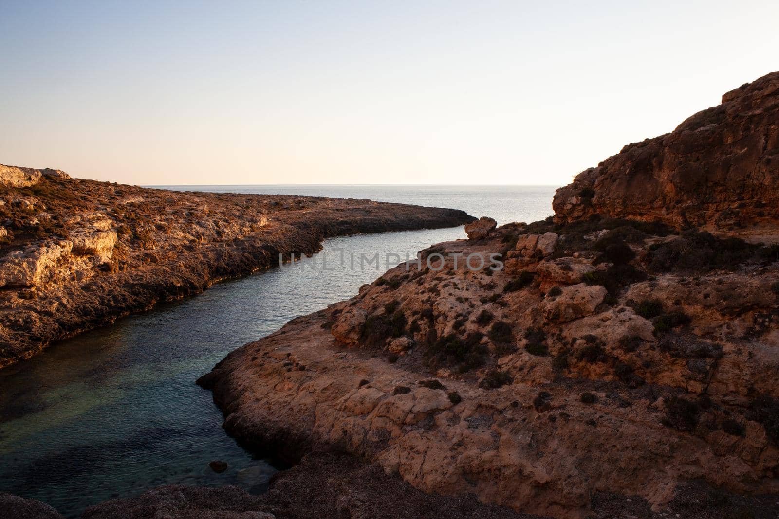 View of Cala Stretta at sunset in the summer season, Sicily
