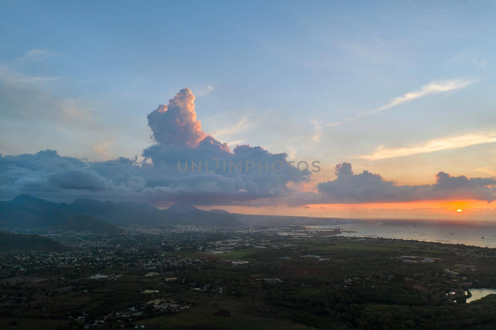 Top view of the sunset city and mountains on the island of Mauritius, Mauritius Island.