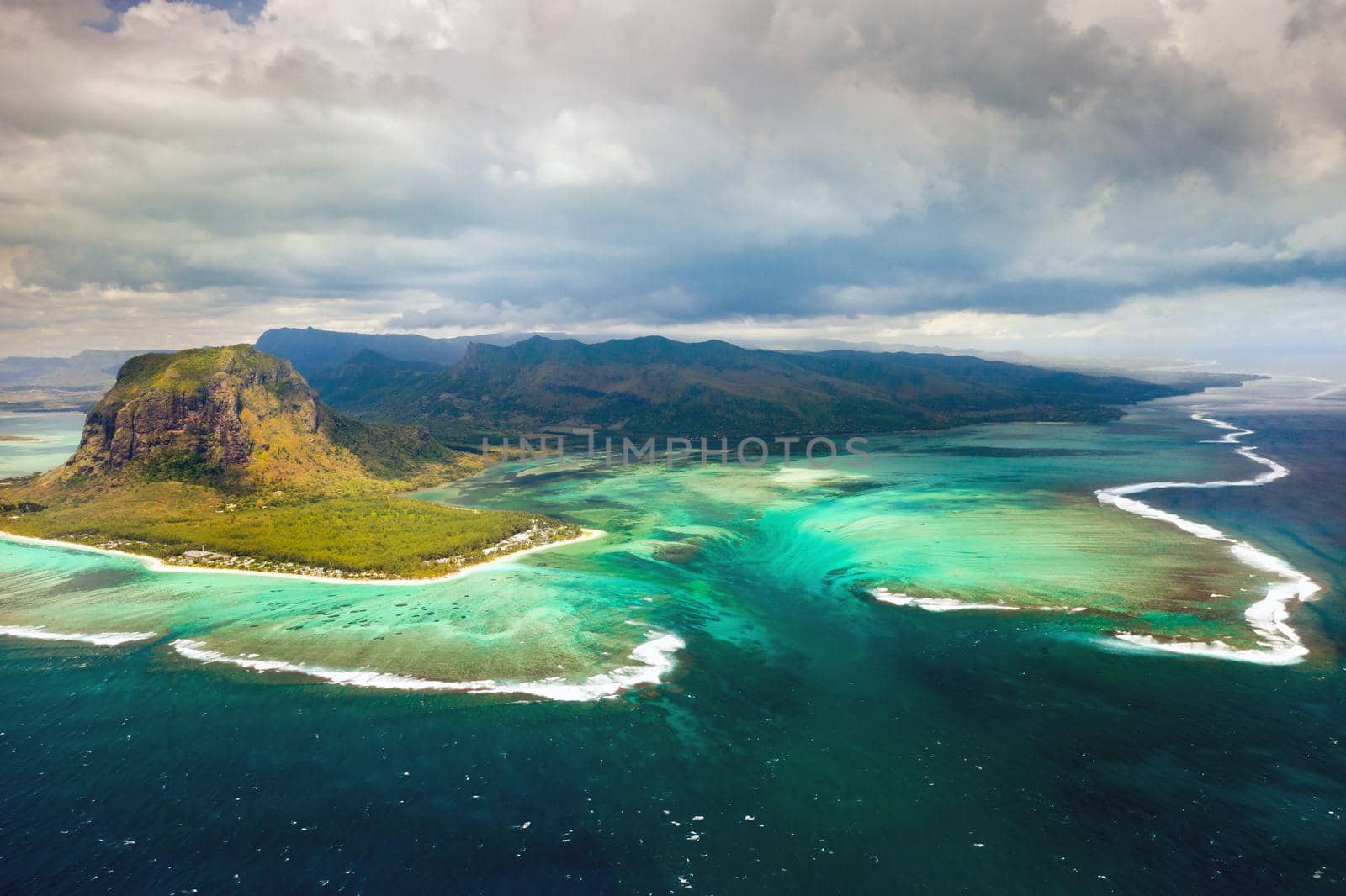 A bird's-eye view of Le Morne Brabant, a UNESCO world heritage site.Coral reef of the island of Mauritius.Storm cloud by Lobachad