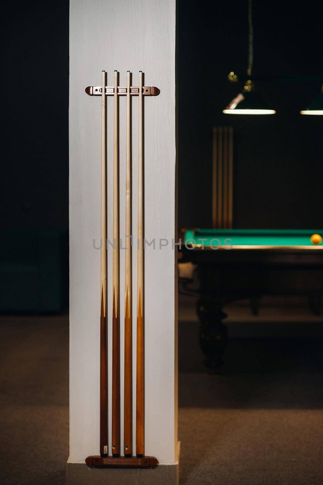 Billiard cue in the game club.Billiard club by Lobachad