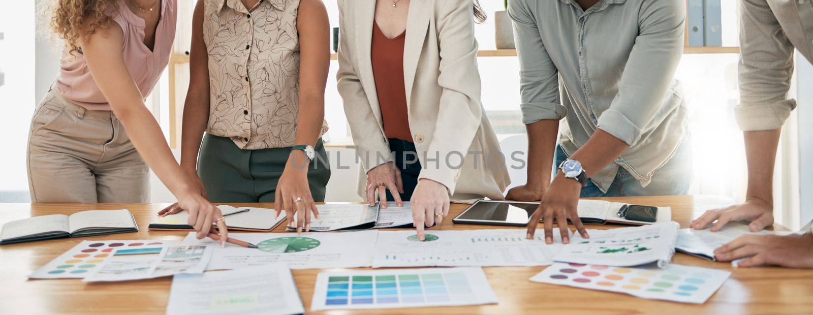 Hands, finance and documents with a business team planning in collaboration for growth in an office. Accounting, data and teamwork with a man and woman employee group working on a financial budget.