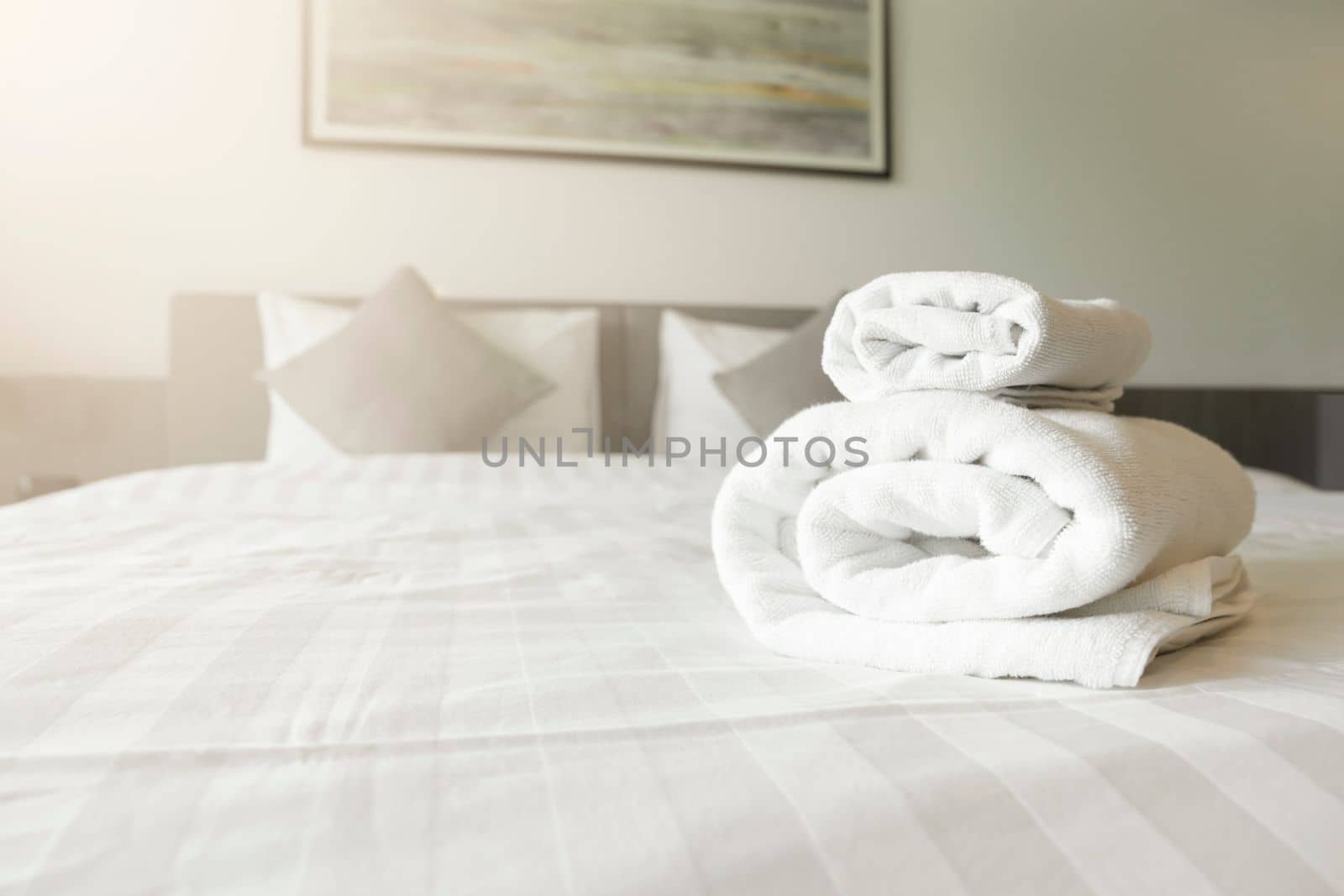 White towel on bed decoration in bedroom interior - Vintage light Filter