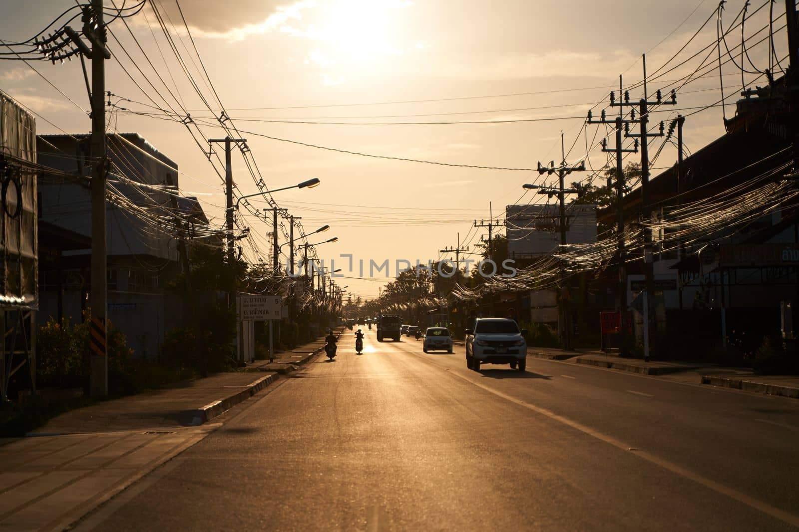 Atmospheric photo traffic on the street in Thailand during sunset by Try_my_best
