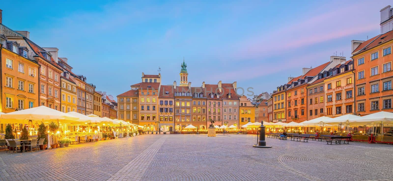 Old town in Warsaw, cityscape of Poland at sunset