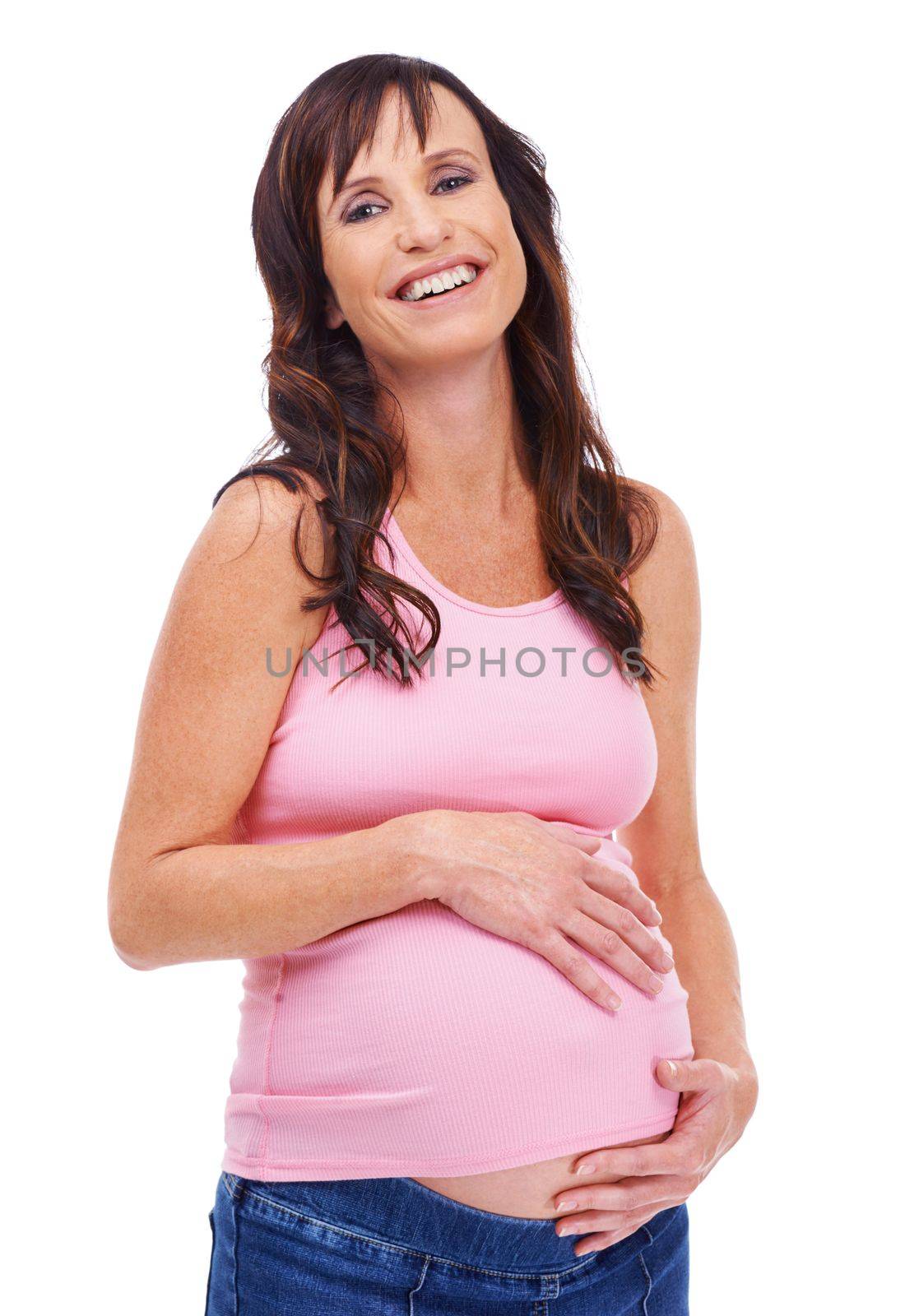 Considering her childs future. A young pregnant woman standing against a white background. by YuriArcurs