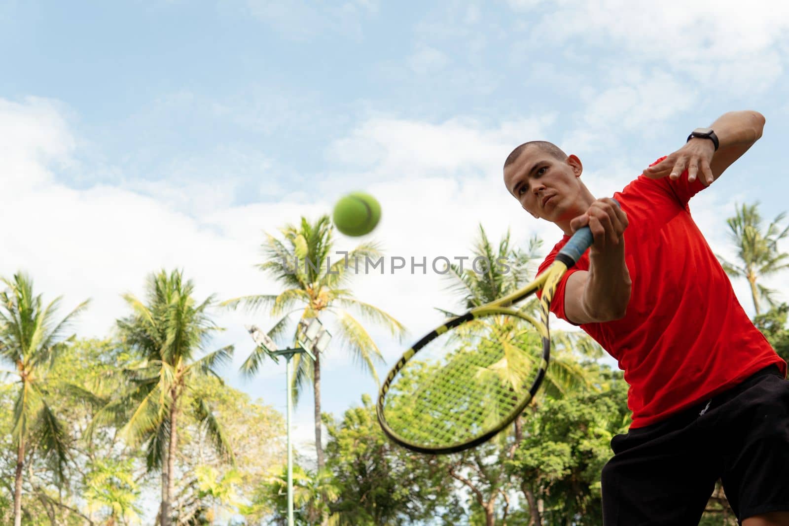 man playing tennis by Alexzhilkin