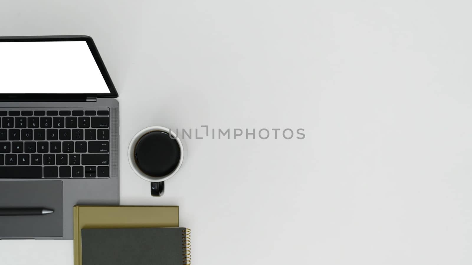 Laptop computer, cup of coffee and books on white background. Copy space for text information or advertise design by prathanchorruangsak