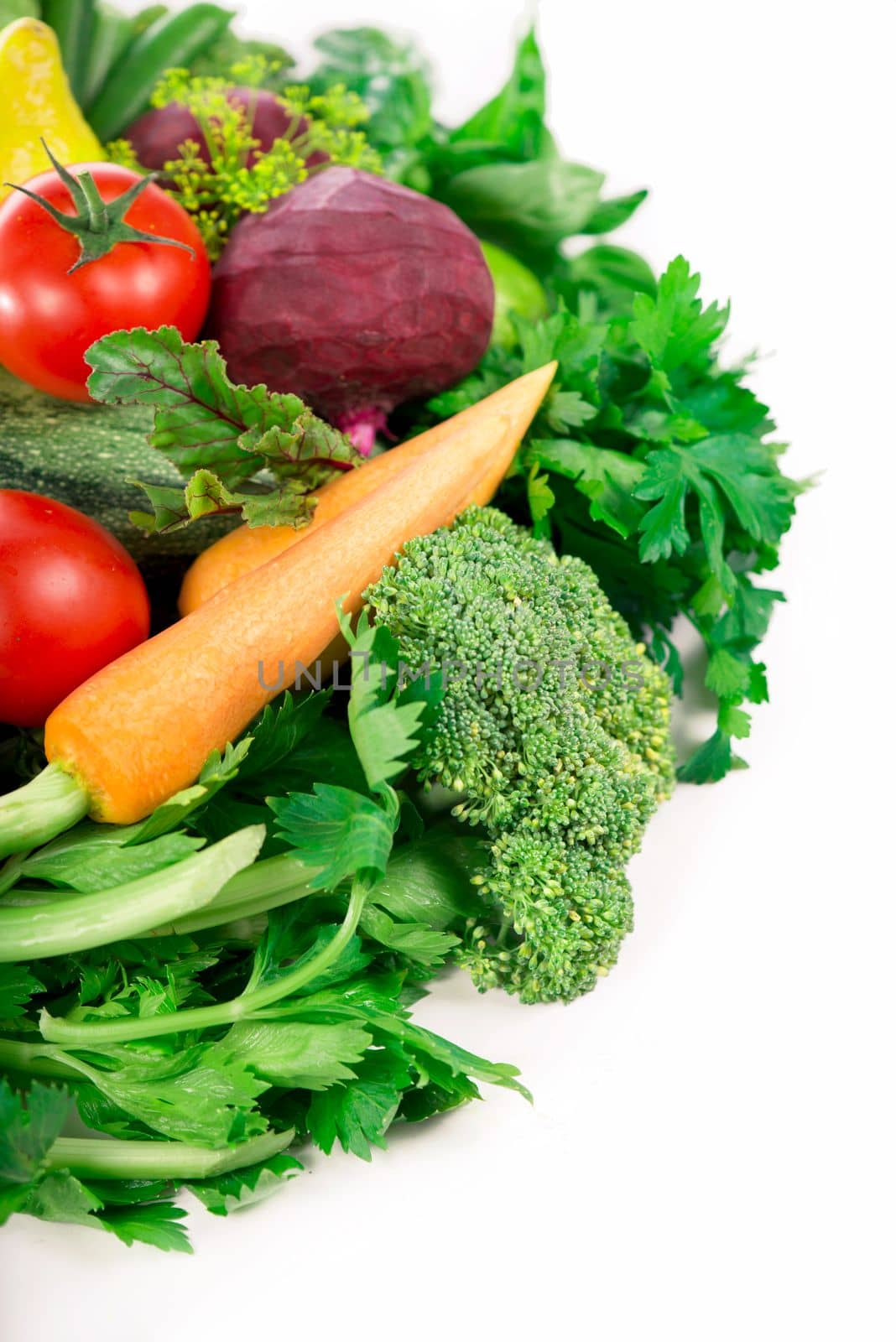 fresh vegetables. Healthy Eating. Seasonal organic raw vegetables. Isolated over white background by aprilphoto