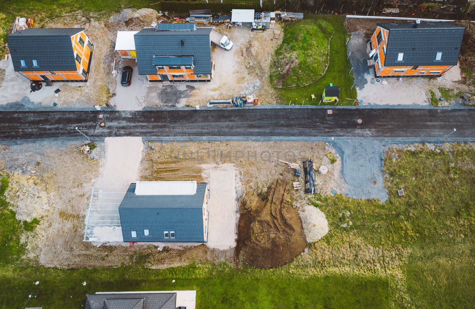 Aerial view of new houses under construction somewhere in the countryside of Slovenia by VisualProductions
