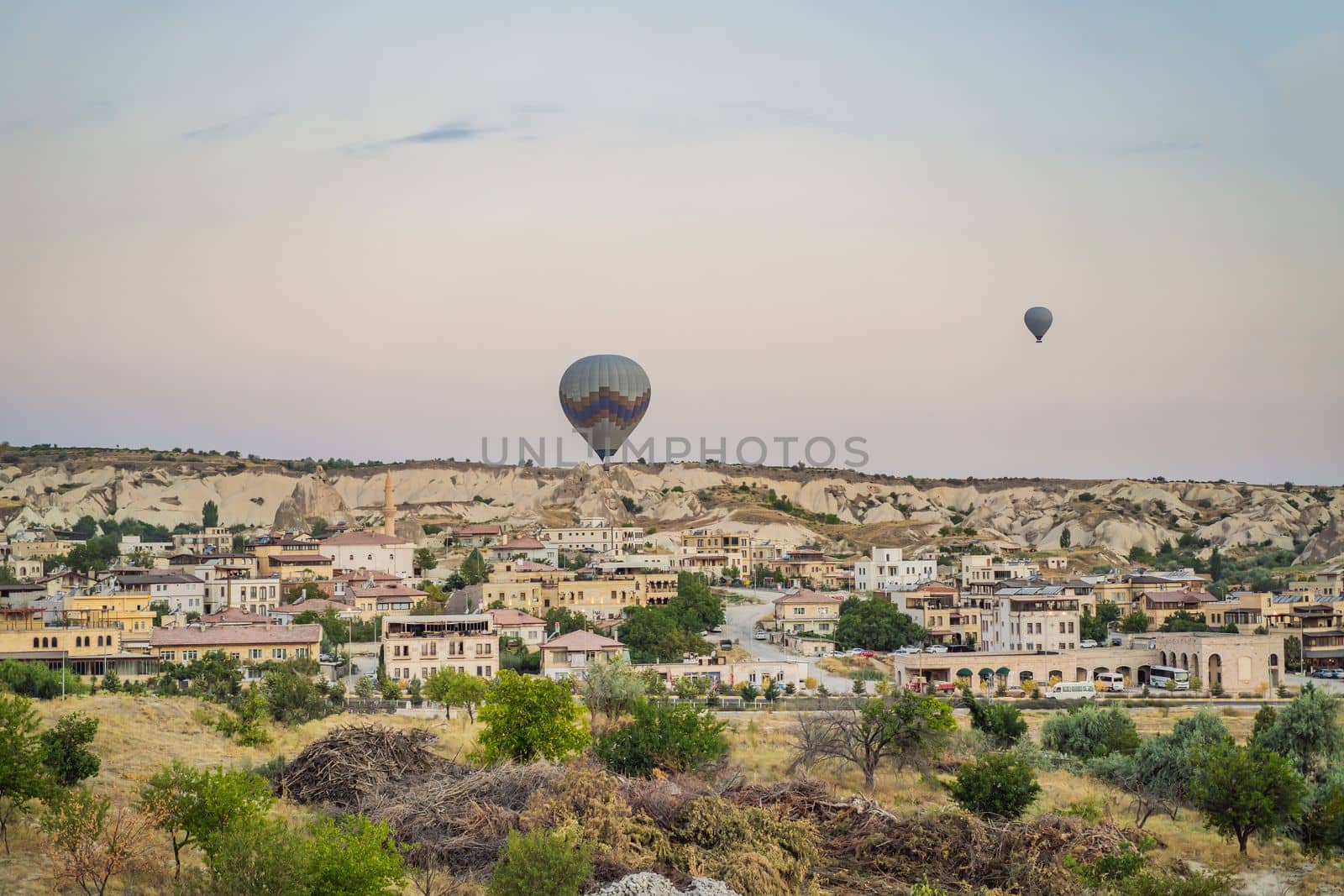 Colorful hot air balloon flying over Cappadocia, Turkey.