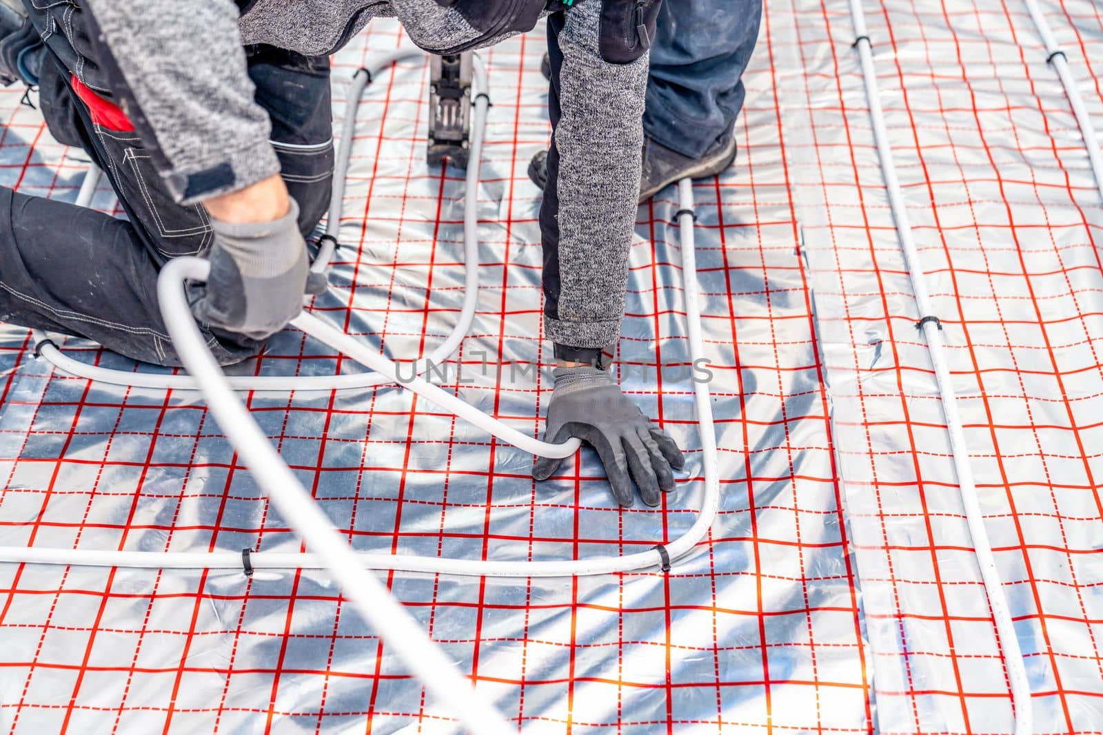 installation of underfloor heating in a new building.