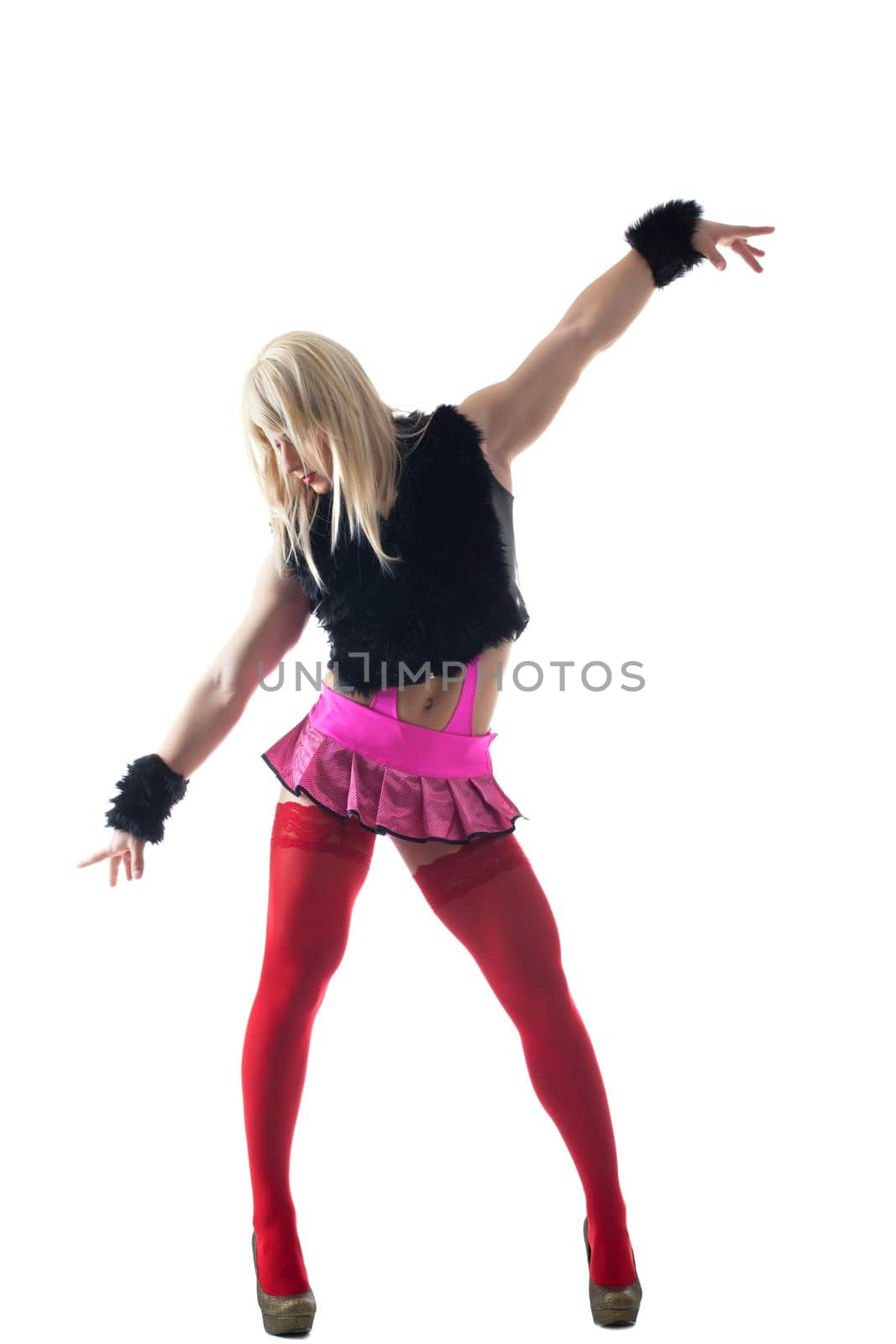 Full length portrait of sexy transvestite in white wig posing. Isolated on white