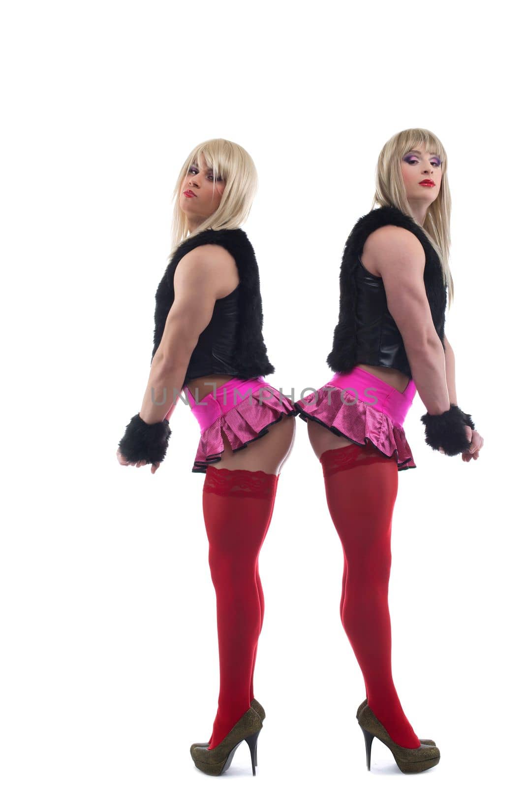 Full length portrait of two transvestites in white wigs. Isolated on white