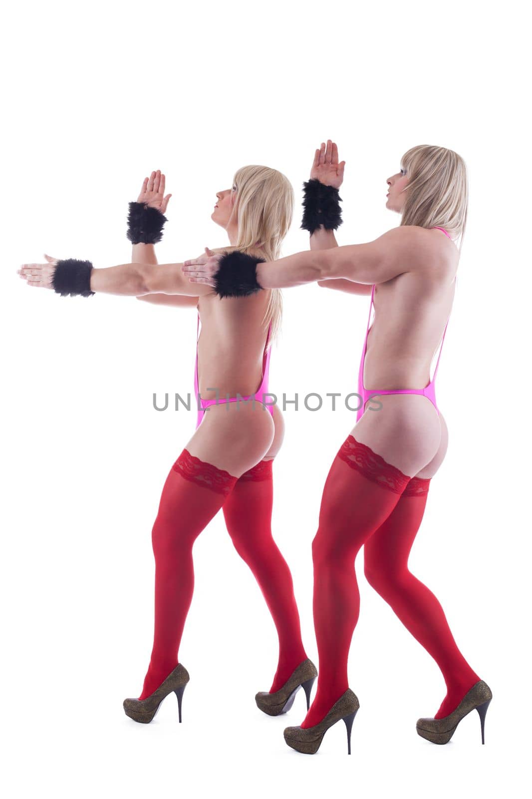 Blonde transvestites posing in red stockings, isolated on white