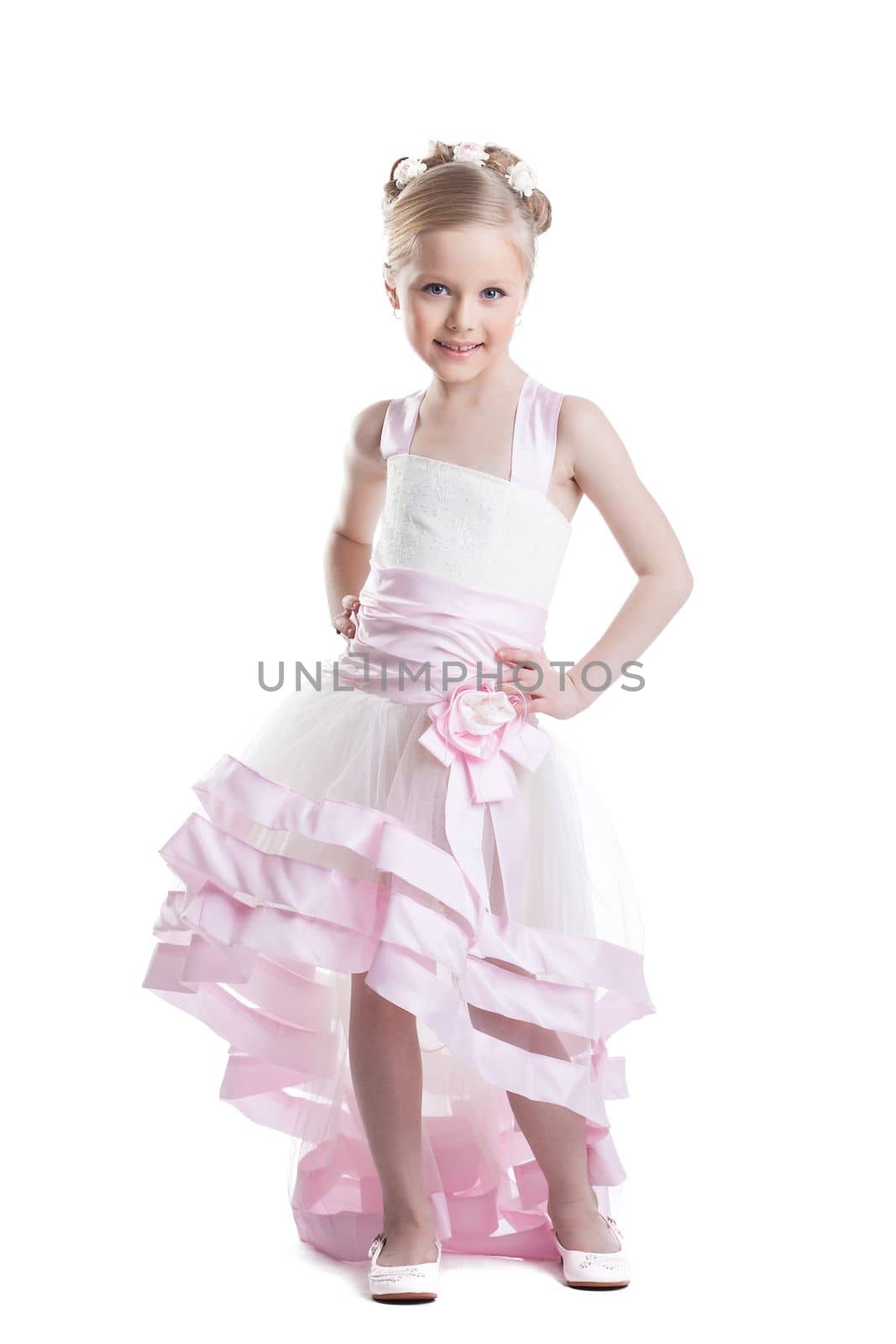 Full length portrait of pretty little girl in beautiful dress. Isolated on white