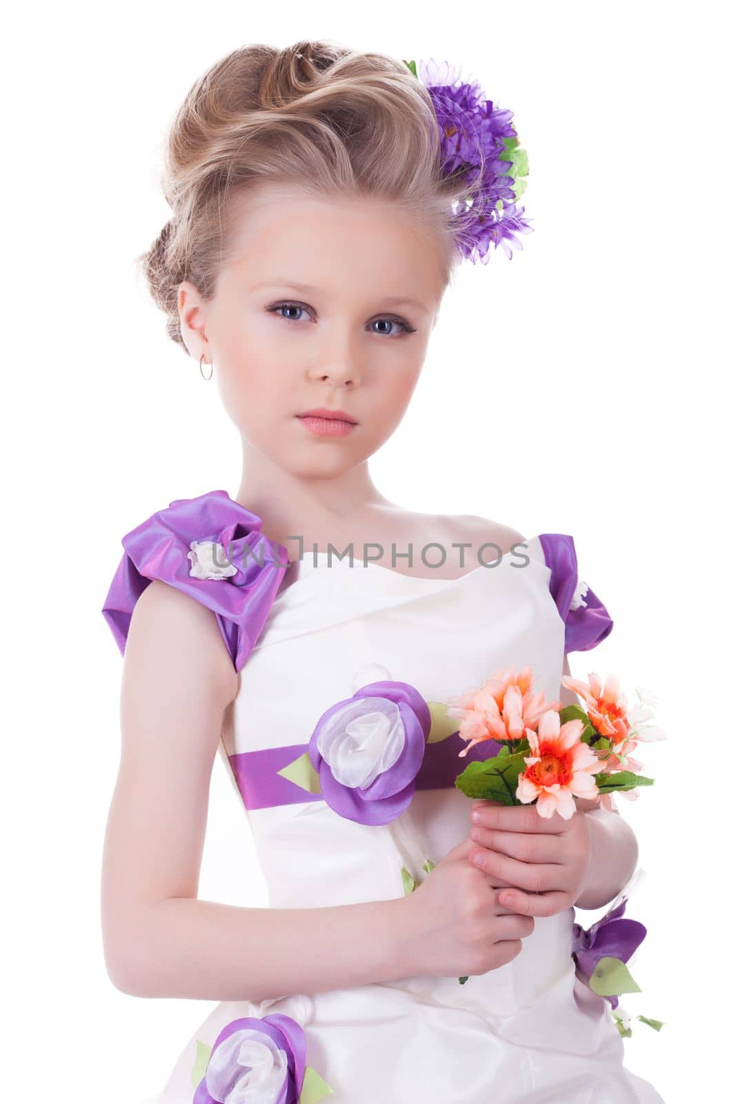 Pretty little girl with bouquet. Isolated on white