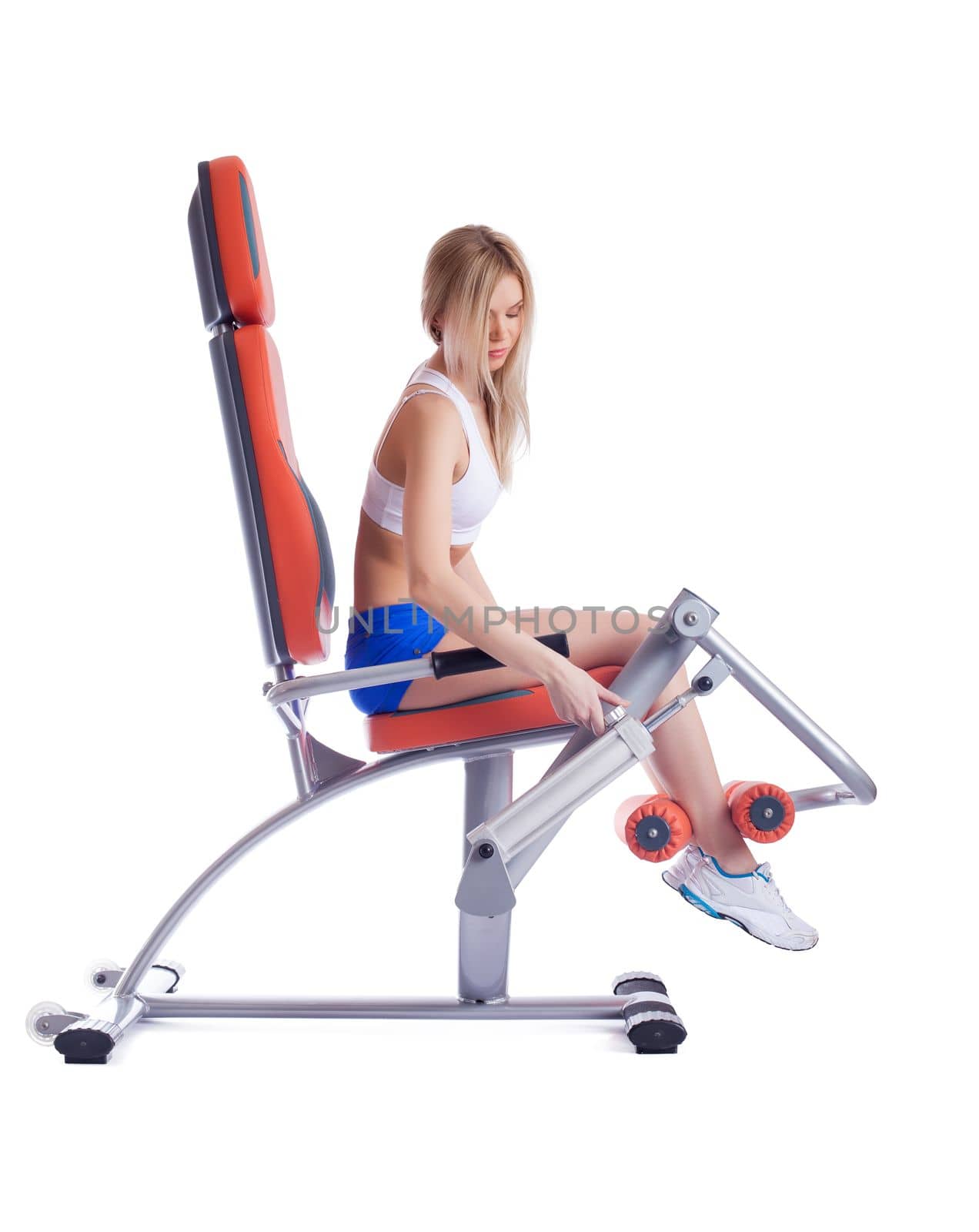 Full length portrait of blonde young woman ajustment isodynamic exerciser. Isolated on white