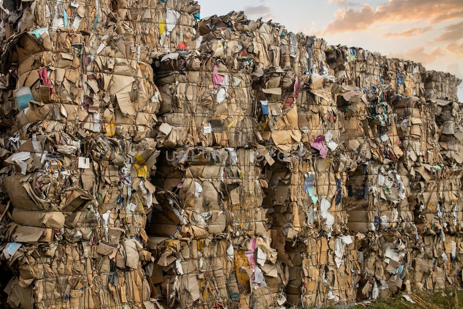 Different kind of paper folded in a pile for recycling.
