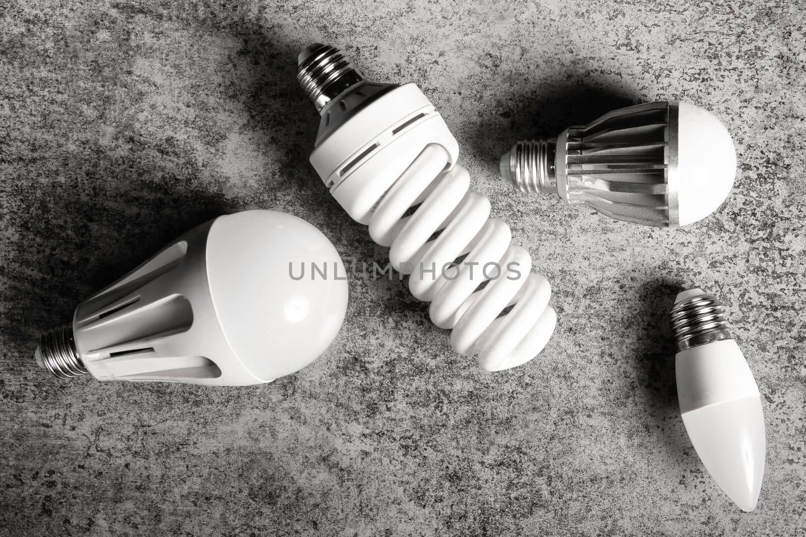 Top view on some electric lamps with different technology - different led, luminescent.
