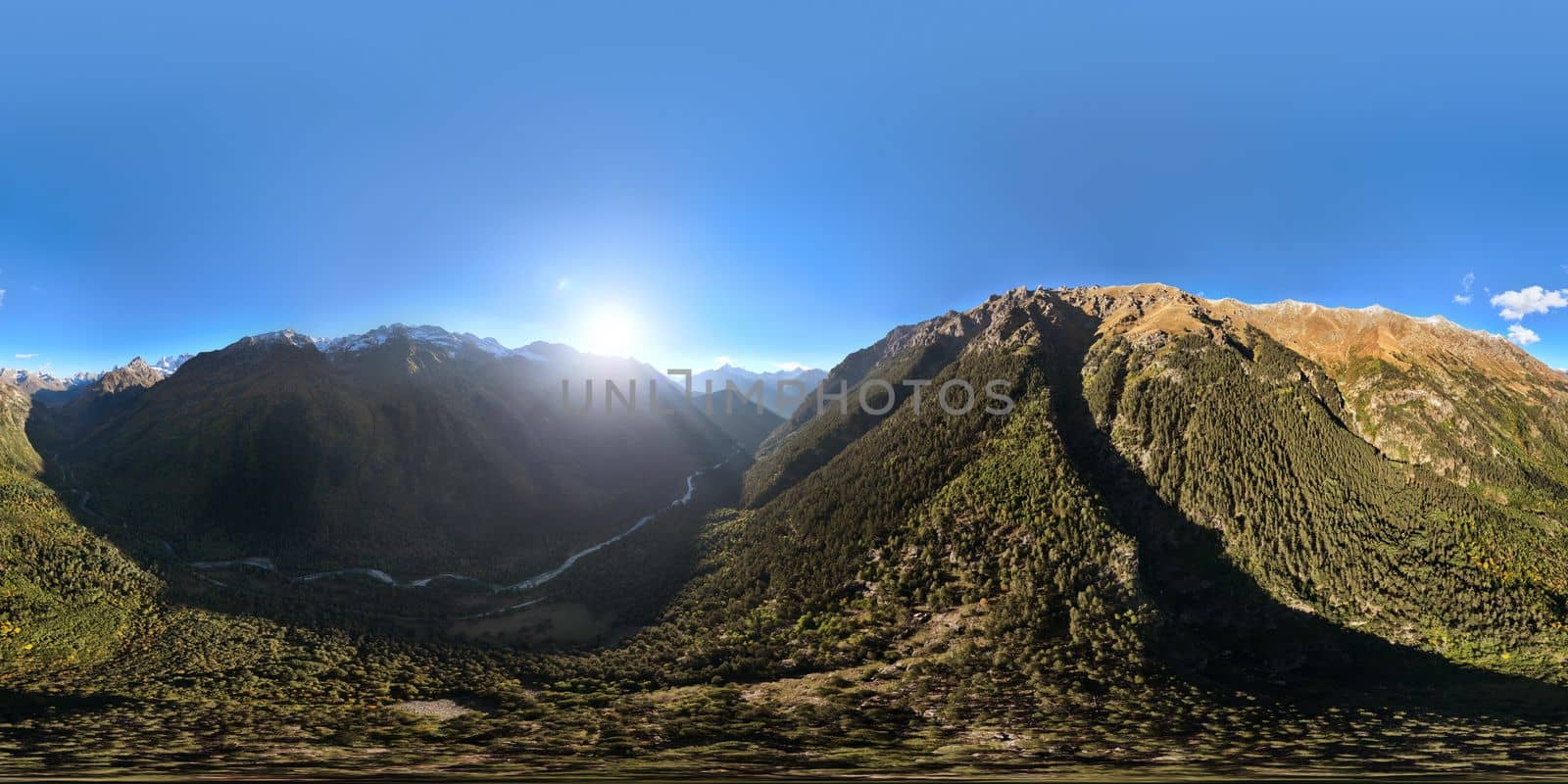 panoramic shot of a mountain range in summer on a sunny cloudless day. bare rocky cliffs by yanik88