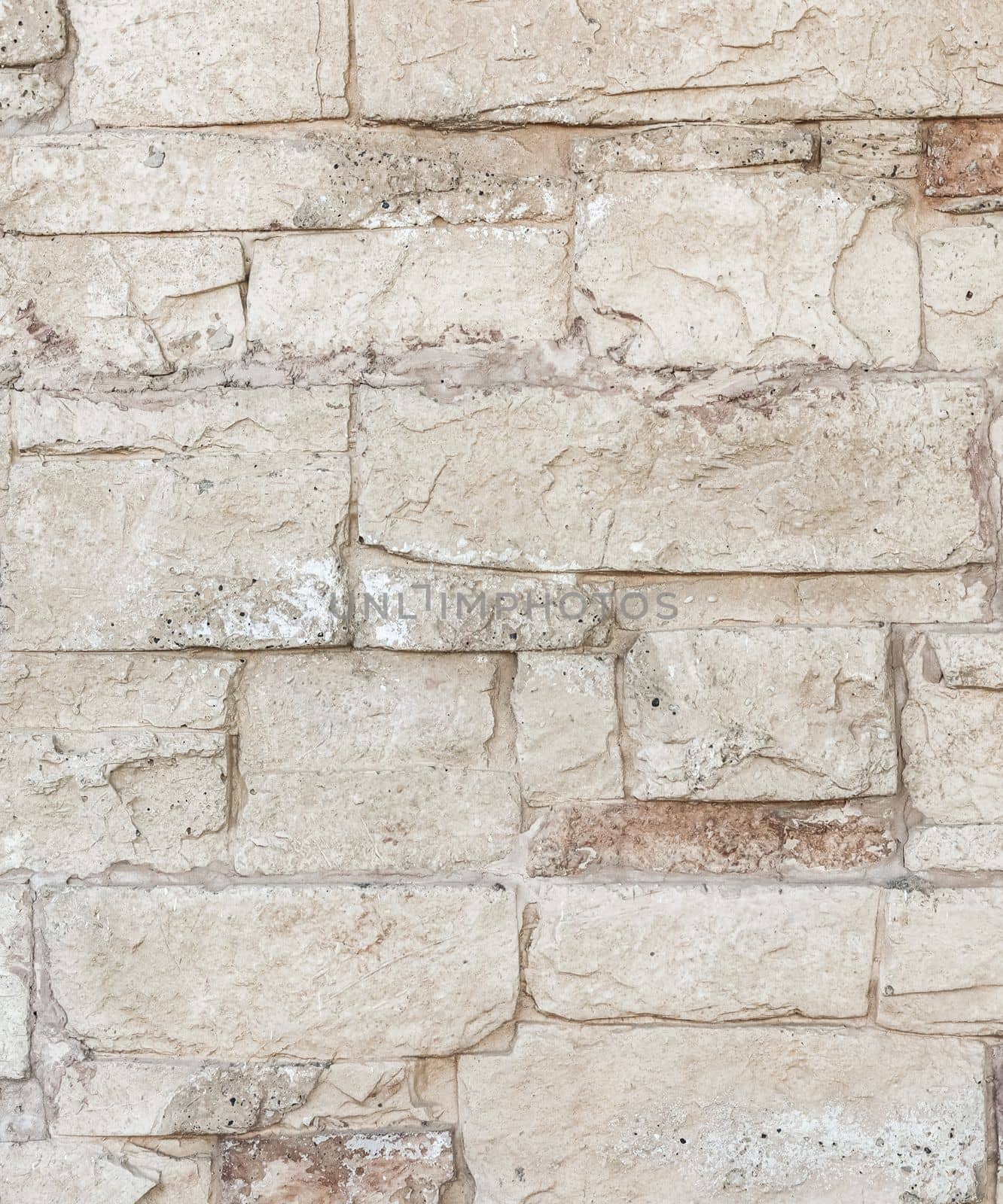 A close up background of white natural stone wall. High quality photo