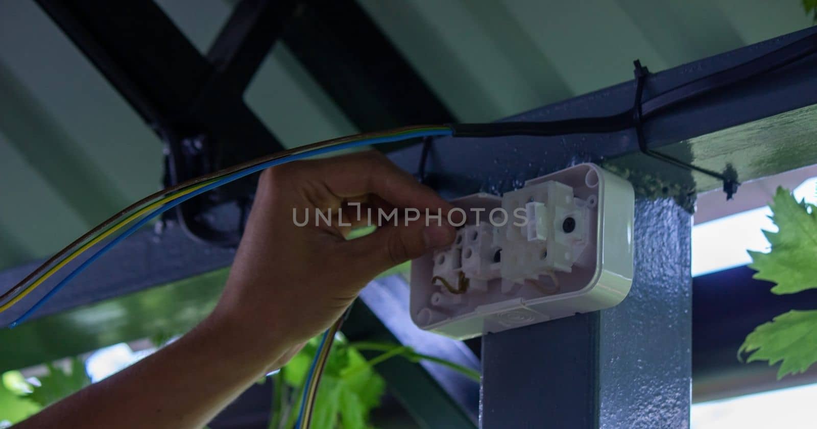 electrician to connect the outlet. selective focus