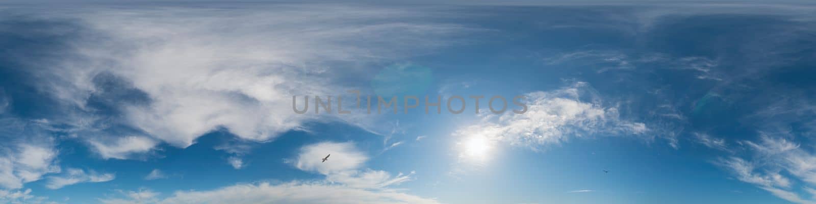 Sky panorama with Cirrus clouds in Seamless spherical equirectangular format. Full zenith for use in 3D graphics, game and editing aerial drone 360 degree panoramas for sky replacement