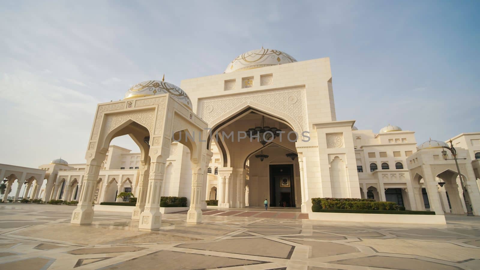 View of white domes of main entrance to Presidential Palace, with designed floor