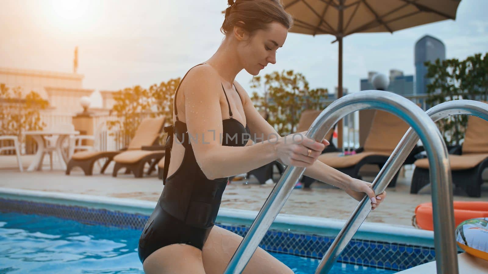 Girl after swimming out of the pool