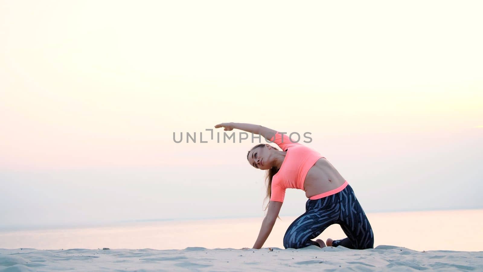 healthy yoga woman meditation at sunrise seaside. High quality photo