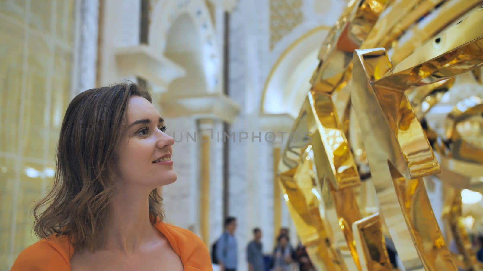 The girl enjoys beautiful scenery at the Presidential Palace in Abu Dhabi